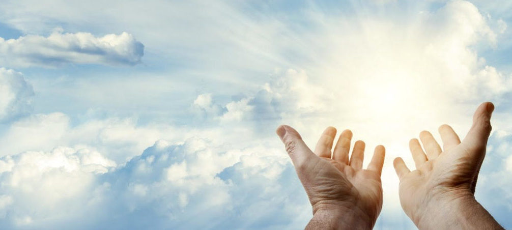 hands raised to God